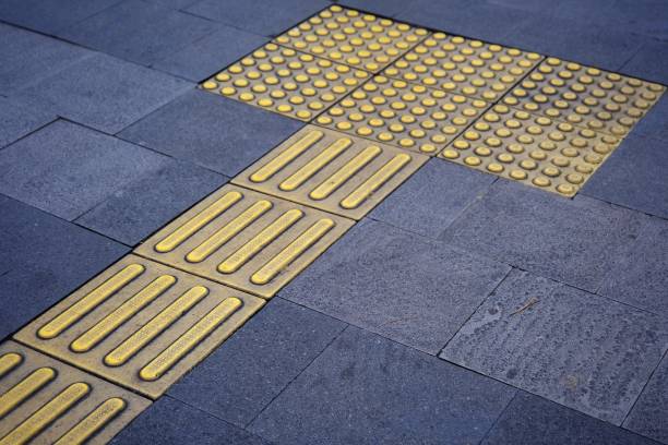 istock Beautiful colorful yellow grey street pattern sidewalk view 2188355779