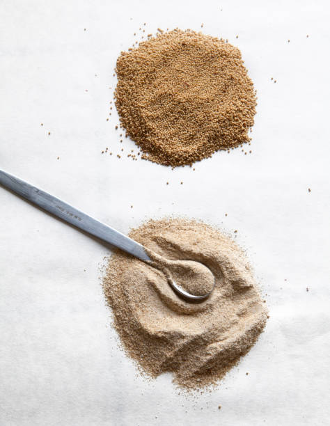 istock Comparing amaranth seeds and flour with measuring spoon on white background 2188356284