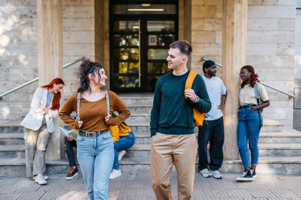 istock Male And Female Student Walking On The University Campus 2188356688