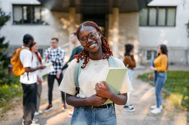 istock Young Woman Standing On The University Campus 2188357024