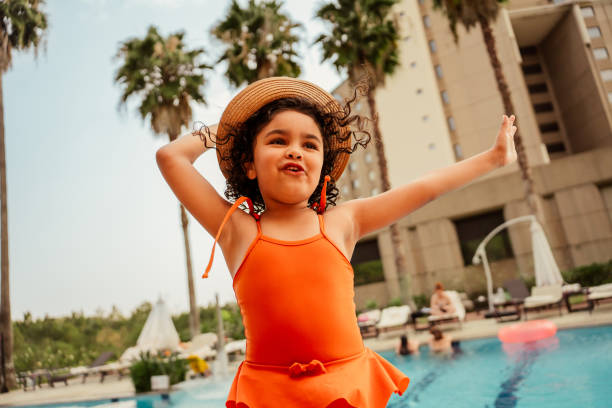 istock Dancing child enjoying vacation at luxury hotel 2188357395