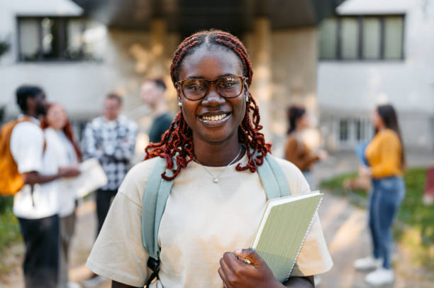 istock Young Woman Standing On The University Campus 2188357437