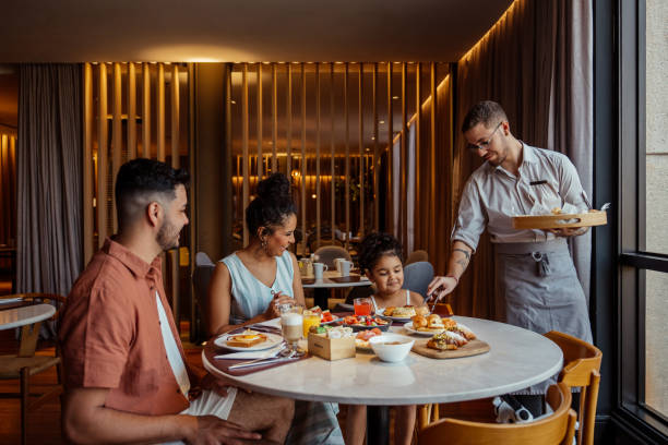 Family having breakfast in hotel