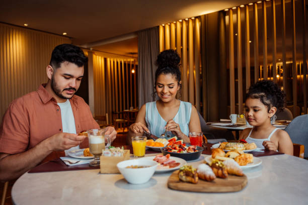 istock Family having breakfast in hotel 2188358148
