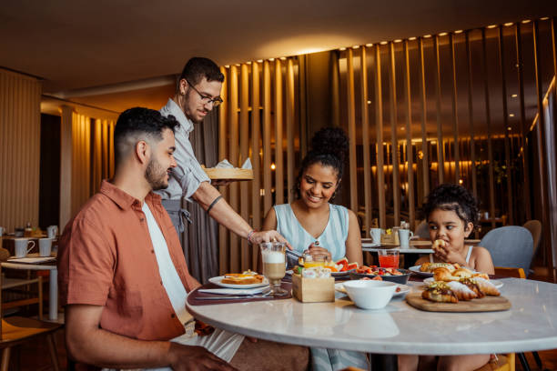 istock Family having breakfast in hotel 2188358151