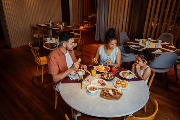 istock Family having breakfast in hotel 2188358174