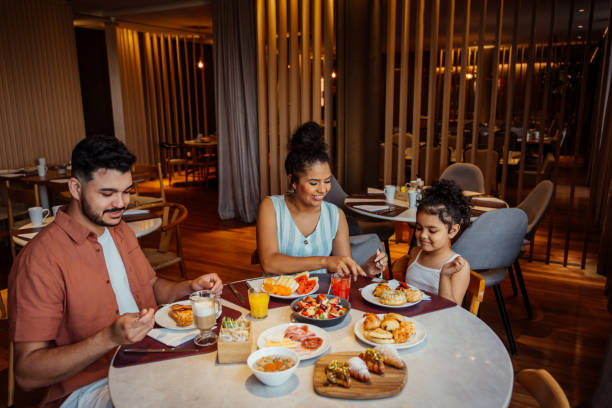 istock Family having breakfast in hotel 2188358177