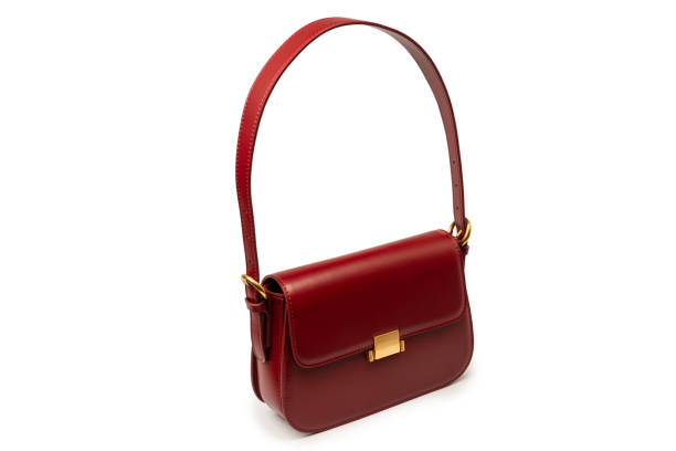 istock Burgundy shoulder leather bag isolated on white background. 2188358231