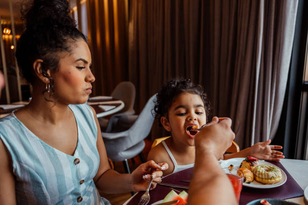 istock Family having breakfast in hotel 2188358265
