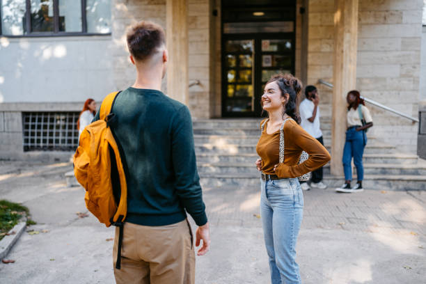 istock Male And Female Student Talking On The University Campus 2188358760