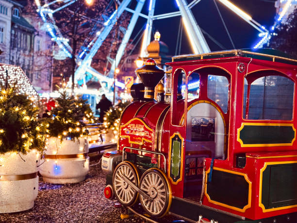 istock Festive Miniature Train at a Christmas Fair 2188359569