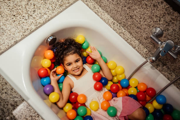 Girl playing in hotel room