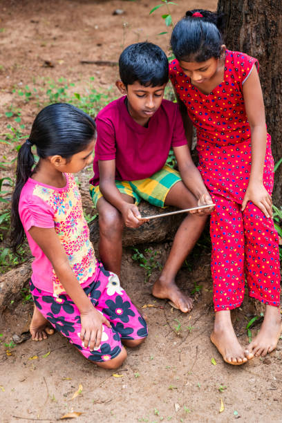istock Sri Lankan teenagers using a digital tablet 2188361960