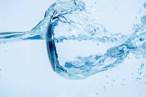 istock Water splash isolated on white background, Air Bubbles Float Up Under Blue Water. Pure Water Wave, Oxygen Relaxation. Blue bubbles Water Textured. 2188368227