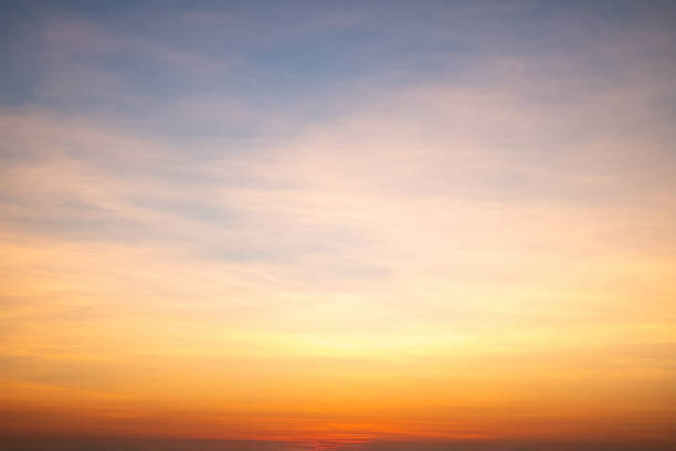 istock Sky,sunset, beautiful , luxury soft gradient orange gold clouds and sunlight on the blue sky perfect for the background, Sunrise on morning or everning in winter warm time ,Twilight summer,silhouette 2188368428