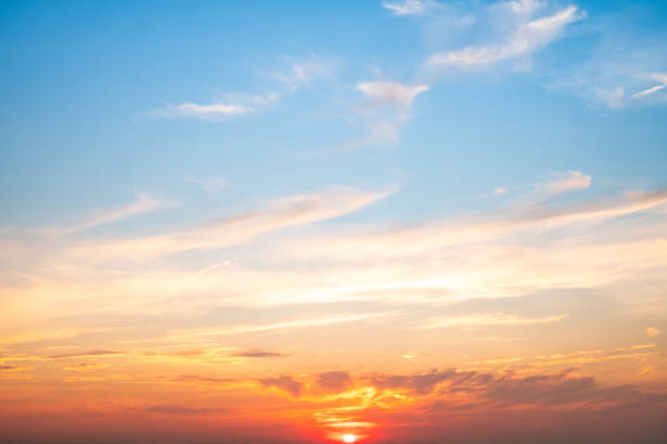istock Sky,sunset, beautiful , luxury soft gradient orange gold clouds and sunlight on the blue sky perfect for the background, Sunrise on morning or everning in winter warm time ,Twilight summer,silhouette 2188368672