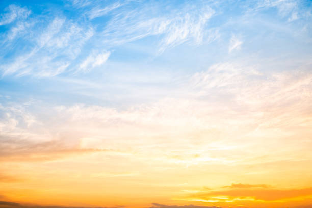 istock Sky,sunset, beautiful , luxury soft gradient orange gold clouds and sunlight on the blue sky perfect for the background, Sunrise on morning or everning in winter warm time ,Twilight summer,silhouette 2188368897