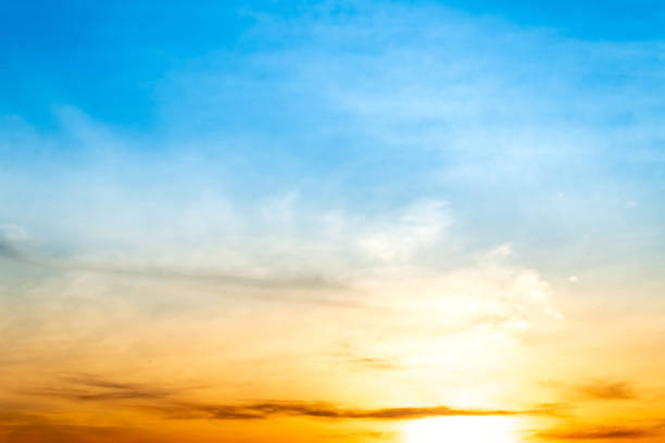istock Sky,sunset, beautiful , luxury soft gradient orange gold clouds and sunlight on the blue sky perfect for the background, Sunrise on morning or everning in winter warm time ,Twilight summer,silhouette 2188368932