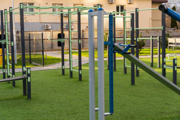 istock This dynamic fitness space features various gym equipment and exercise machines, perfect for both individual workouts and group training sessions. The green environment encourages a healthy lifestyle 2188370262