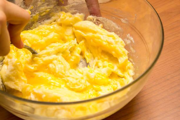 istock Chef whisking eggs and flour in glass bowl for baking a cake 2188371300