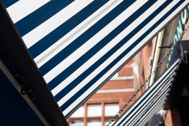 Under a canopy outside a cafe restaurant