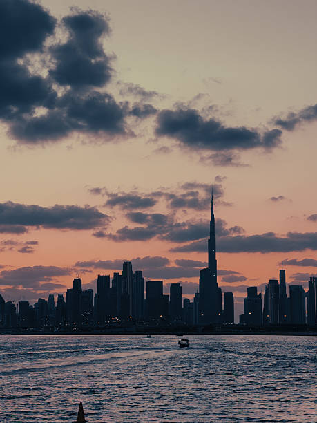 istock Dubai skyline at sunrise with soft morning light reflecting on the skyscrapers, creating a peaceful yet majestic urban landscape. 2188377452