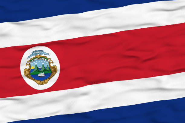 The national flag of Costa Rica depicted waving in the wind, featuring five horizontal bands of blue, white, and red, with the national coat of arms placed within the red stripe on the left side. The blue symbolizes the sky and opportunity, white represents peace and wisdom, and red signifies the blood shed for freedom.