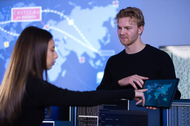 istock Cyber security teamwork in a Cyber Security Operations Center SOC to protect systems and technologies 2188379065