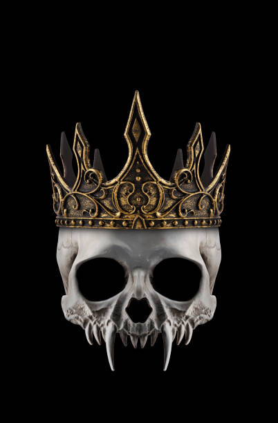 Vampire skull with long sharp fangs and ancient golden crown on black background