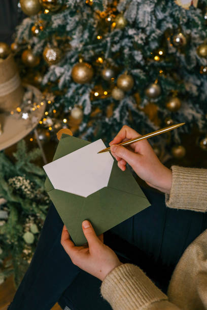 istock Girl holding letter with space for text, Christmas mood 2188384362