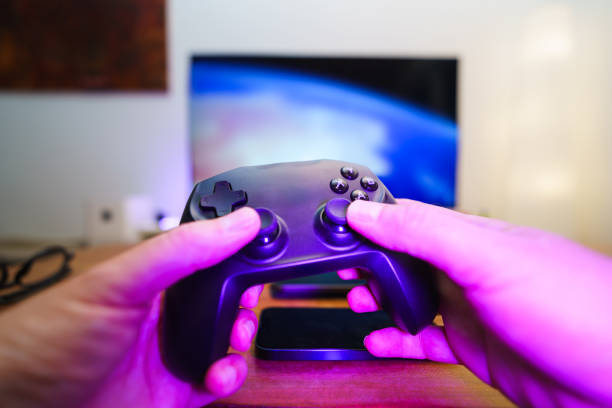 istock home entertainment game pad living room interior neon light 2188385647