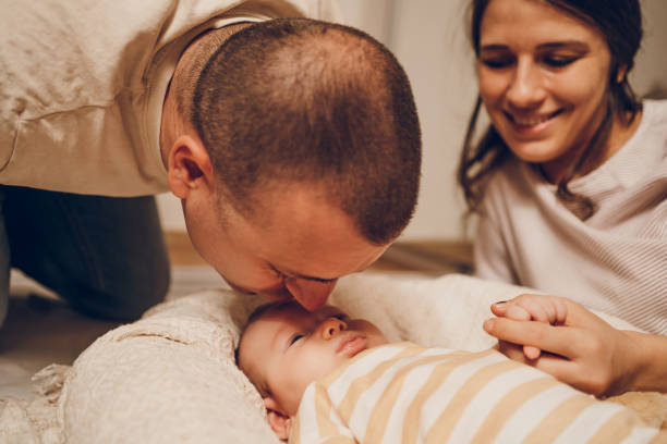 istock Parents enjoy with newborn baby 2188387456