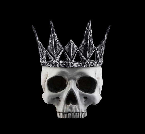 istock Human skull with ancient crown isolated on black background 2188387725