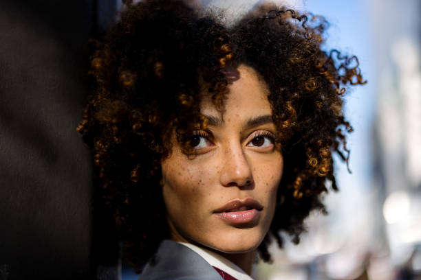 istock Confident Woman Outdoors in Urban Setting with Soft Natural Light 2188388510