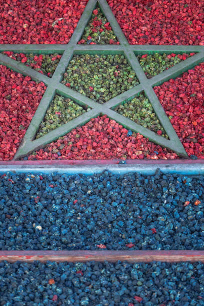 herbs in multiple colours make up the flag of Morocco; Marrakech, Morocco
