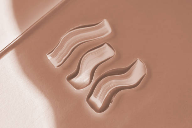 istock Foundation swatch with spf on a beige background. 2188388842