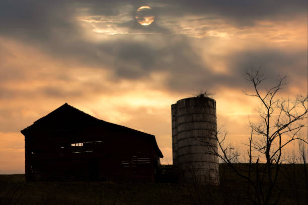 Sunset god rays over a random farm barn in Freehold, NJ