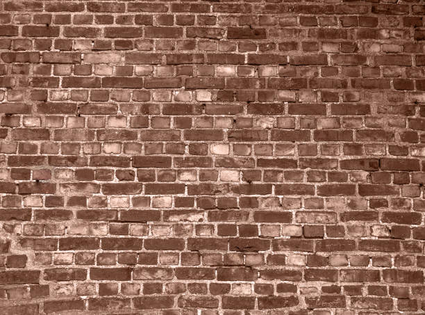Antique brickwork background. Old aged brick background. Demonstrating color of 2025 year