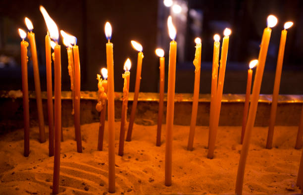 istock Candles light in the holy sepulchre cathedral in Jerusalem 2188395726