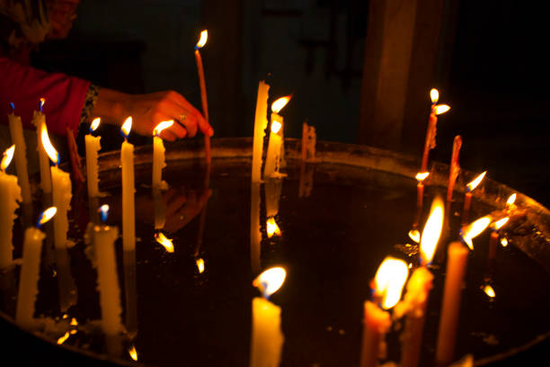Candles light in the holy sepulchre cathedral in Jerusalem