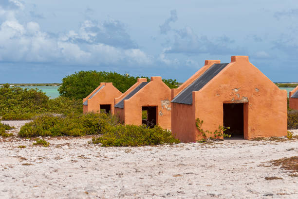 istock Multiple historic red slave hut sin Bonaire, Caribbean 2188396272