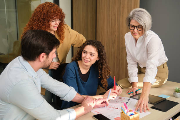 istock Business people working together on a project in the office 2188396467