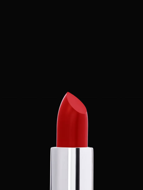 istock Scarlet lipstick in a silver case on a black reflective surface, demonstrating an elegant and minimalist design. 2188402988