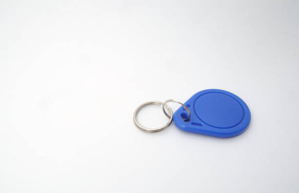 Colorful plastic key tag isolated on white background