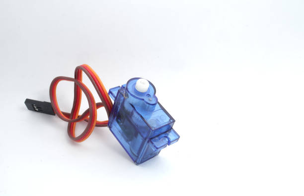 A blue plastic micro servo on a white background. An electrical device that can push or rotate an object with very precise control of angular position, acceleration, and speed. Used by electronics, mechatronics, robotics, and remote control hobbyists. a blue plastic micro servo on a white background. an electrical device that can push or rotate an object with very precise control of angular position, acceleration, and speed. used by electronics, mechatronics, robotics, and remote control hobbyists.