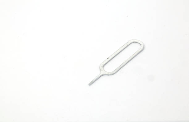 istock a SIM Card Tray Removal Tool on white background. A tool commonly used on smartphones. 2188406810