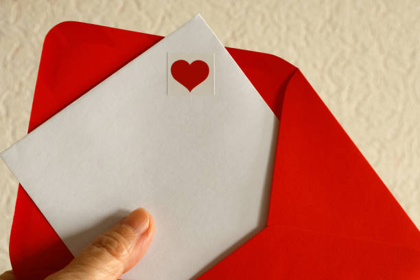 istock red envelope with white card and heart sticker 2188409298