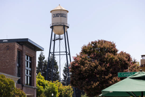 Campbell, California, USA - August 29, 2024: Afternoon sun shines on historic 1928 steel water tower of downtown Campbell.