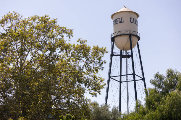 Campbell, California, USA - August 29, 2024: Afternoon sun shines on historic 1928 steel water tower of downtown Campbell.