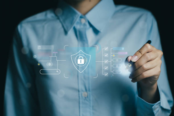 istock person in blue shirt interacts with digital security interface, showcasing data protection and technology concepts. image conveys sense of innovation and cybersecurity 2188412664